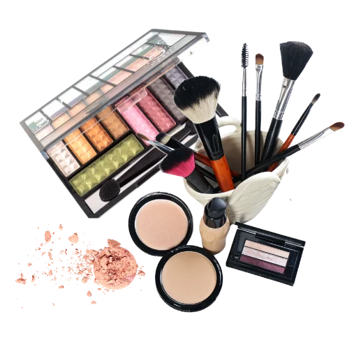 An array of makeup products and brushes including eyeshadow palettes, powders, and a foundation bottle, displayed on a black background.
